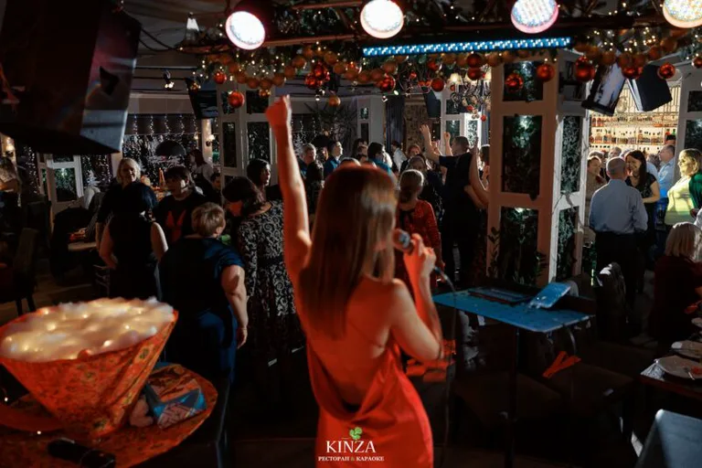 KINZA — riverside veranda